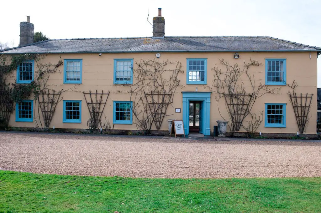 South Farm in Bedfordshire, with blue windows and doors, is the perfect wedding venue