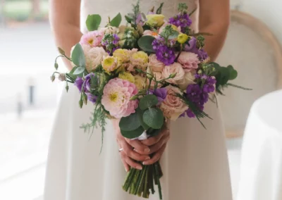 Event photography in Bedfordshire - a bridal bouquet in pink, purple and lemon