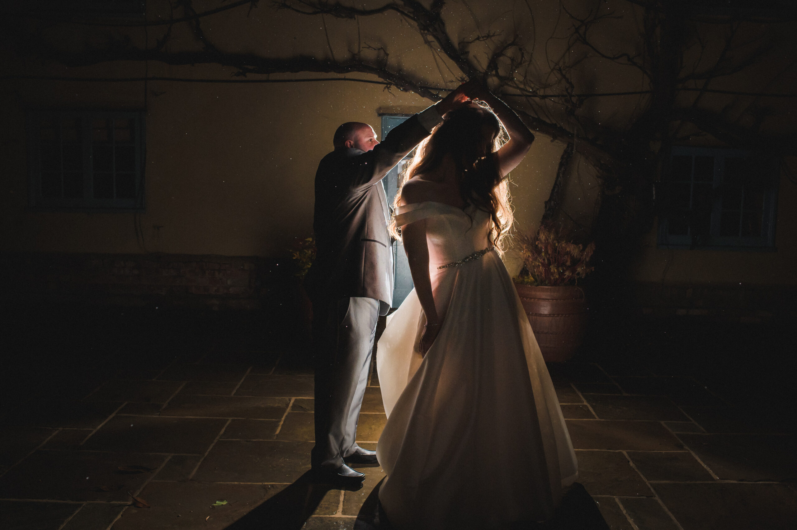 Wedding Photographer in Bedfordshire - A bride and groom dancing