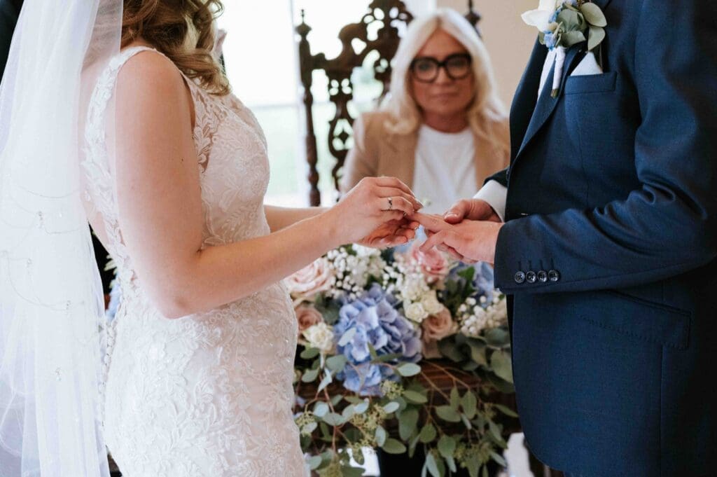 Braxted Park Wedding Photographer - Exchanging of the rings