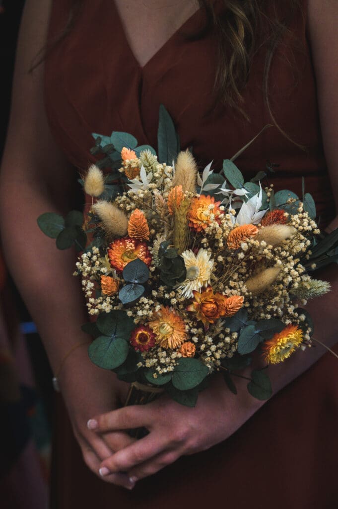 Oxford wedding photographer - a close up of the bride's bouquet made with autumnal dried flowers