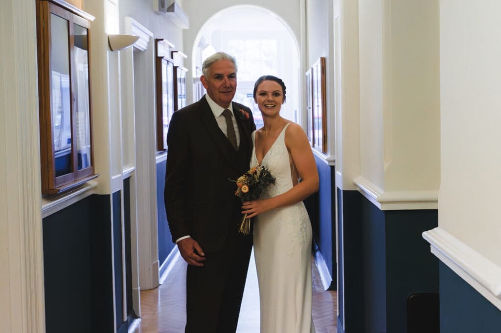 Oxfordshire Wedding Photographer - A bride with her father before walking into the ceremony room