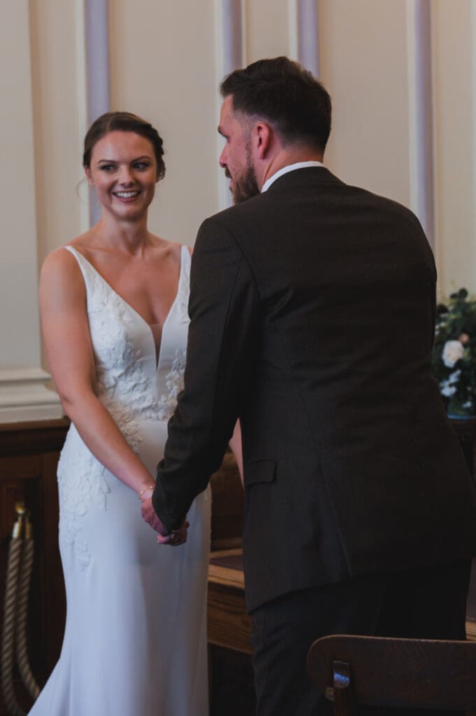 Oxfordshire Wedding Photographer - A couple exchange vows