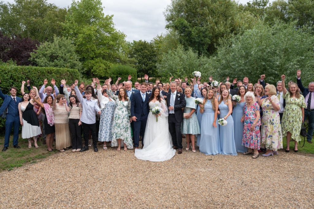 Wedding photo list shot of Bride and Groom with all their guests